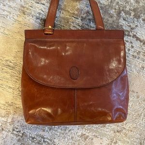 Italian made quality leather satchel, large space inside. vintage 90’s. Quality!
